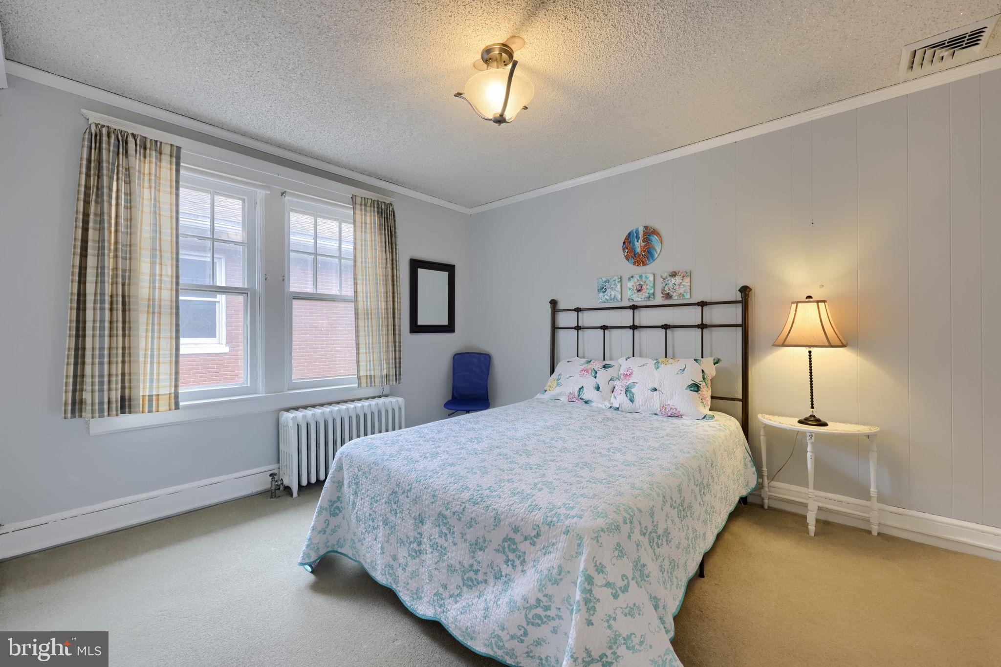 1013 Locust Street Columbia, PA 17512 - Photo 40 of 47 a bedroom with a bed and a window