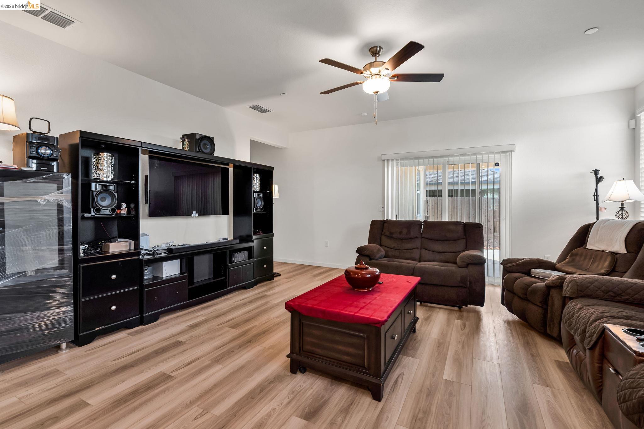 2087 Stars Drive Rio Vista, CA 94571 - Photo 15 of 51 a living room with furniture flat screen tv and wooden floor