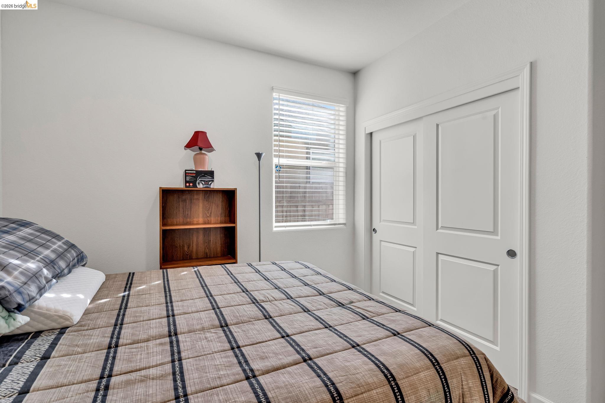 2087 Stars Drive Rio Vista, CA 94571 - Photo 19 of 51 a bedroom with a bed and a view of kitchen