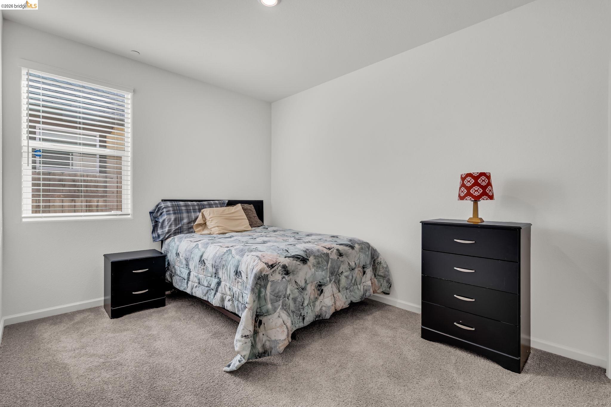 2087 Stars Drive Rio Vista, CA 94571 - Photo 22 of 51 a bedroom with a bed and a dresser
