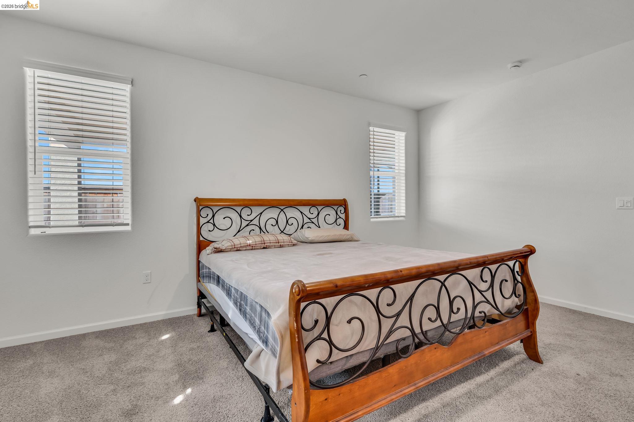 2087 Stars Drive Rio Vista, CA 94571 - Photo 25 of 51 a bedroom with a bed and a window
