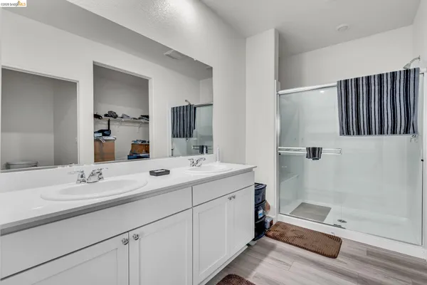 a bedroom with a bed and a closet