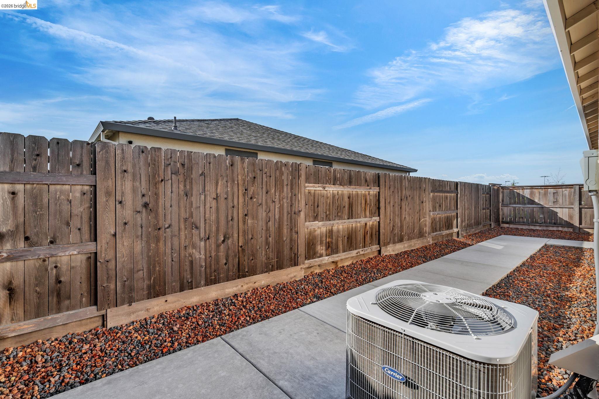 2087 Stars Drive Rio Vista, CA 94571 - Photo 27 of 51 a backyard of a house with wooden fence