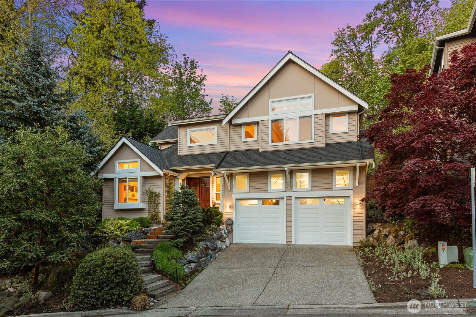 2290 140th Way Southeast Bellevue, WA 98007 - Photo 1 of 39 a front view of a house with yard