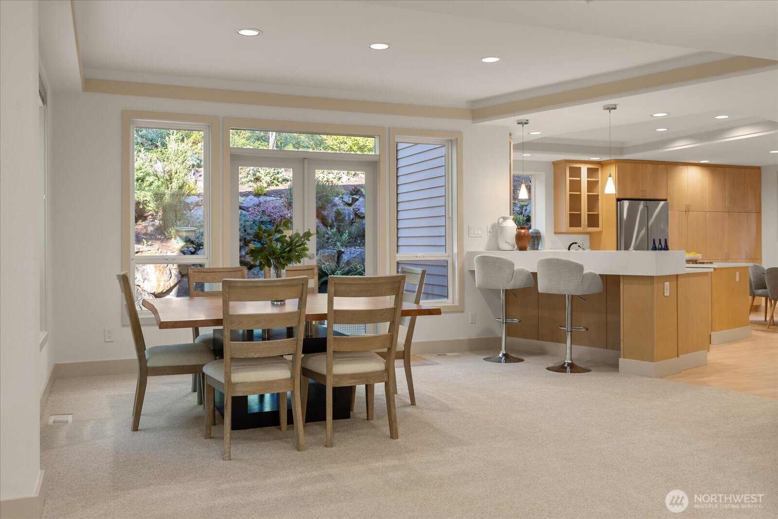 2290 140th Way Southeast Bellevue, WA 98007 - Photo 12 of 39 a view of a dining room with furniture window and outside view