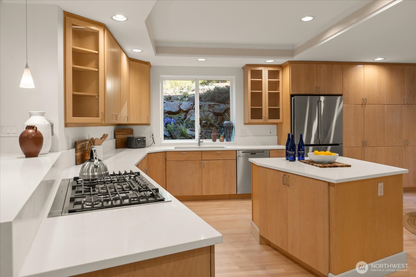 2290 140th Way Southeast Bellevue, WA 98007 - Photo 15 of 39 a kitchen with a stove and a refrigerator