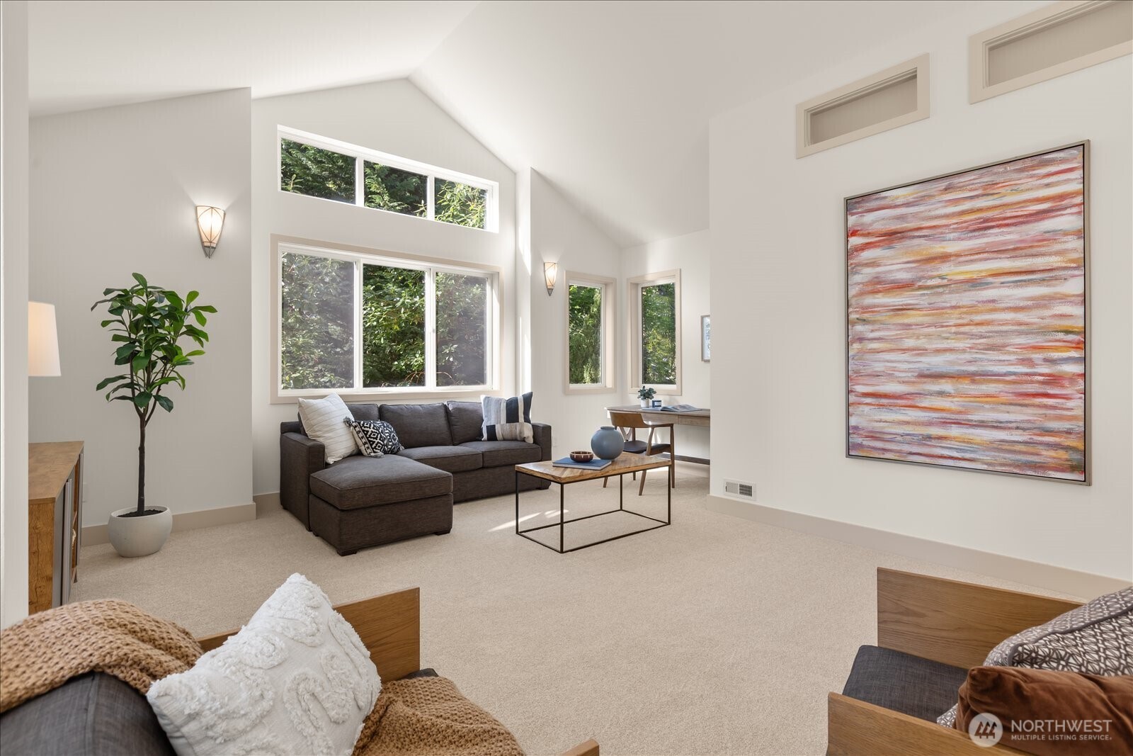 2290 140th Way Southeast Bellevue, WA 98007 - Photo 22 of 39 a living room with furniture and a large window