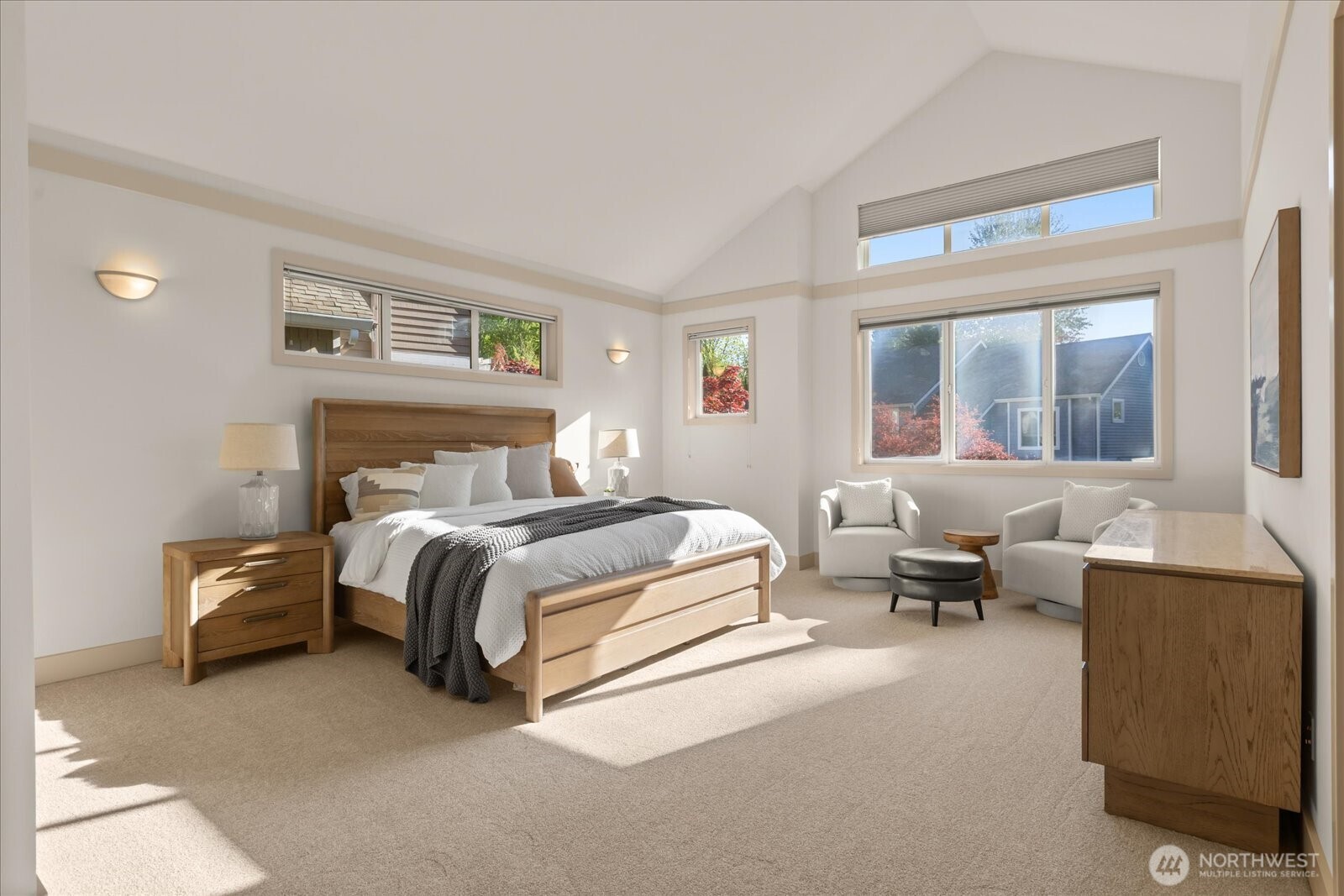 2290 140th Way Southeast Bellevue, WA 98007 - Photo 24 of 39 a spacious bedroom with a bed and a couch