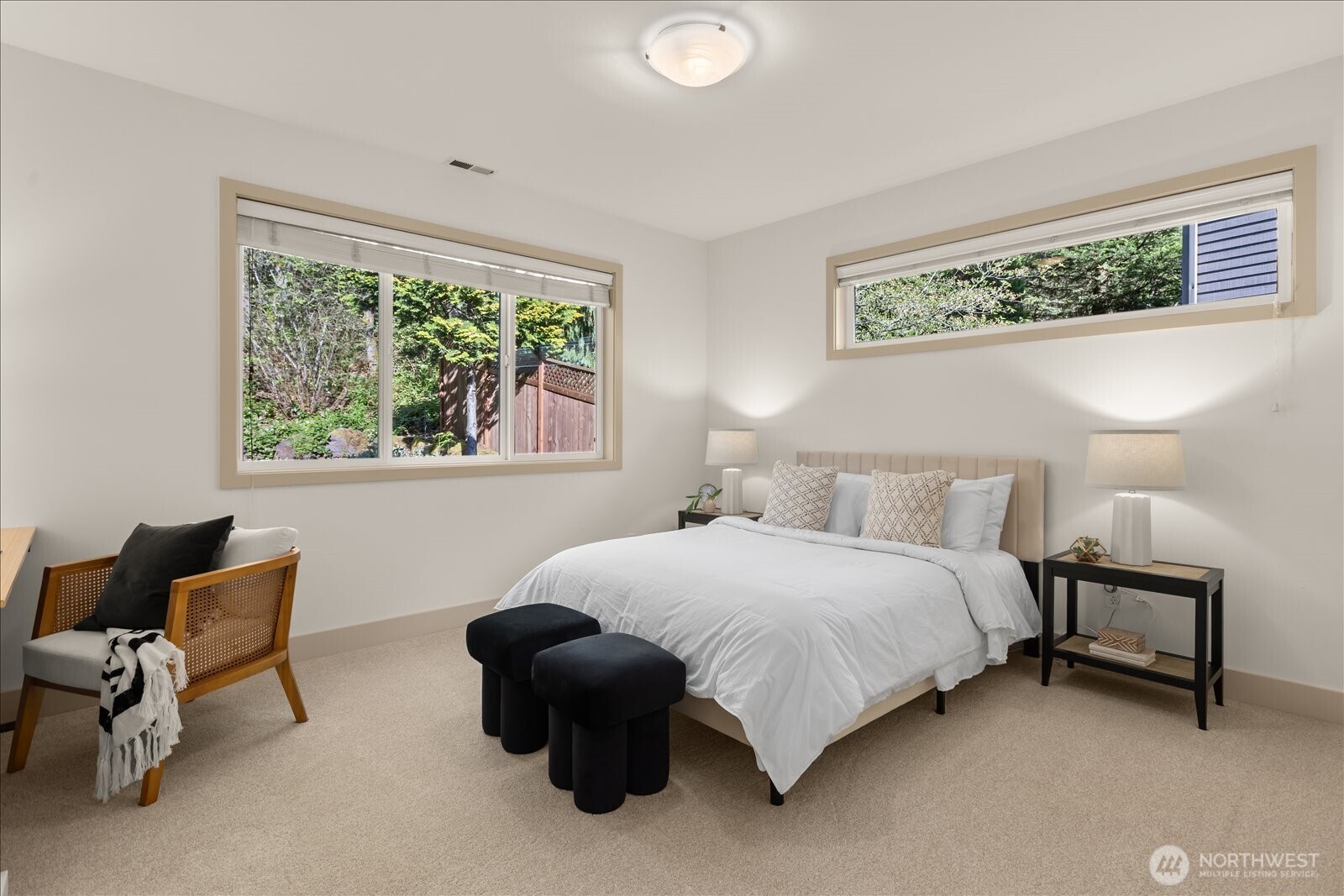 2290 140th Way Southeast Bellevue, WA 98007 - Photo 31 of 39 a bedroom with a bed chair and window