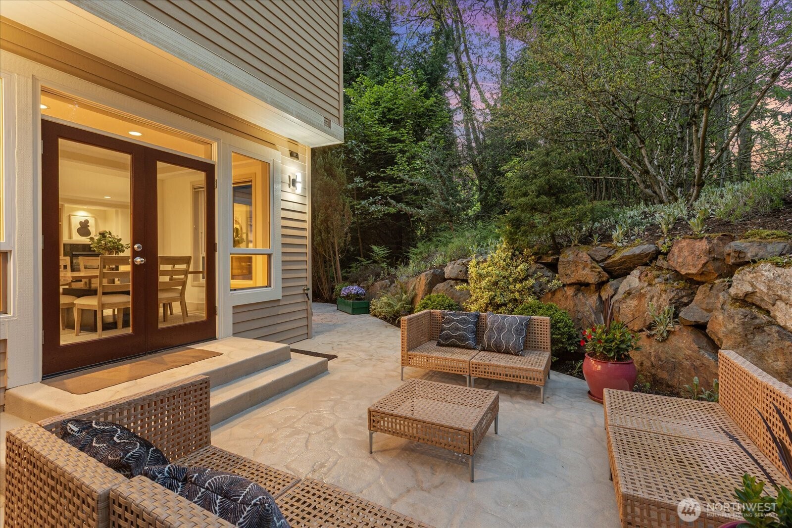 2290 140th Way Southeast Bellevue, WA 98007 - Photo 35 of 39 a view of a patio with couches and table and chairs with wooden floor and fence