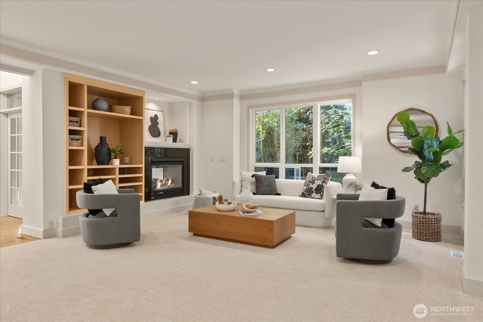 2290 140th Way Southeast Bellevue, WA 98007 - Photo 6 of 39 a living room with furniture potted plant and a fireplace