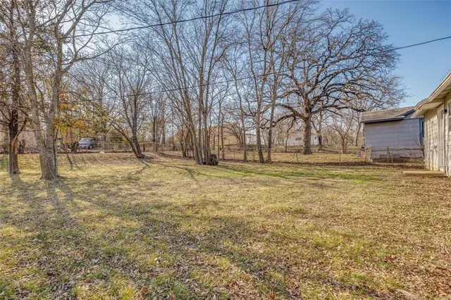a view of open space with trees