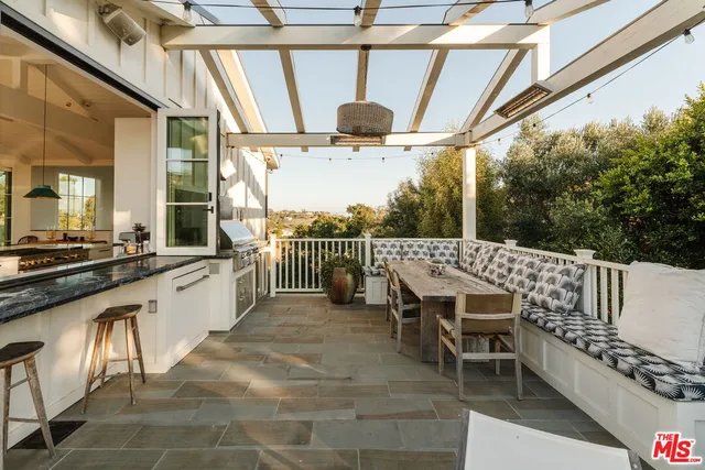 a view of a car park in front of house