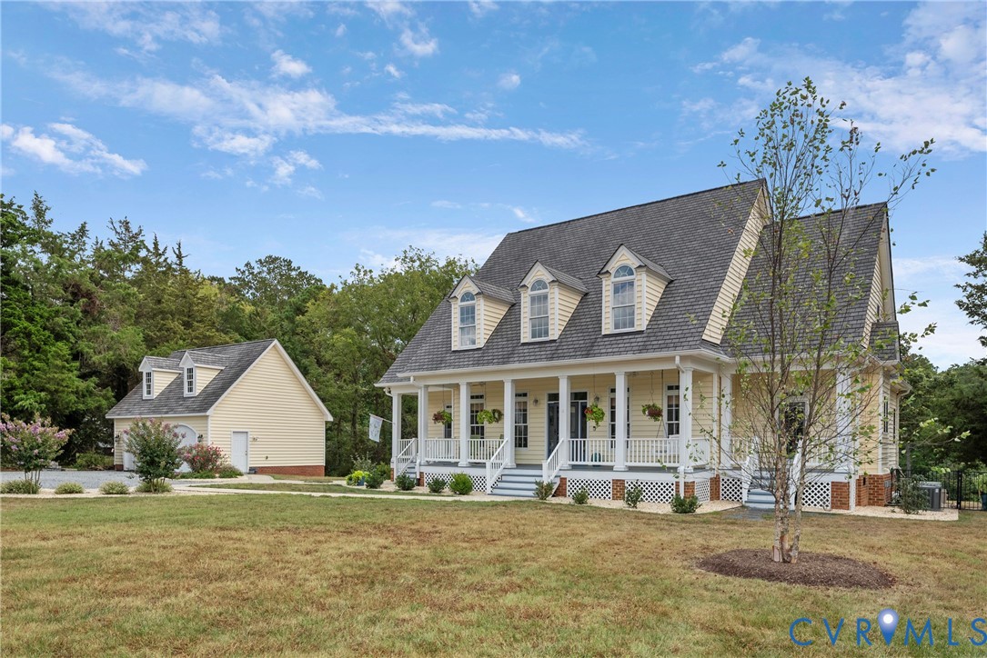 935 Ring Farm Road White Stone, VA 22578 - Photo 14 of 52 Cape cod-style house with a porch and a front lawn
