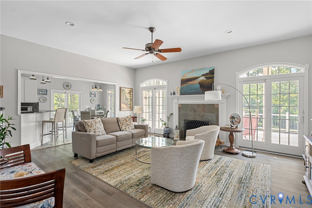 935 Ring Farm Road White Stone, VA 22578 - Photo 16 of 52 Living room with ceiling fan, wood finished floors