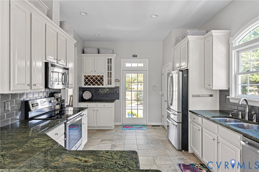 935 Ring Farm Road White Stone, VA 22578 - Photo 21 of 52 Kitchen featuring tasteful backsplash, stainless s