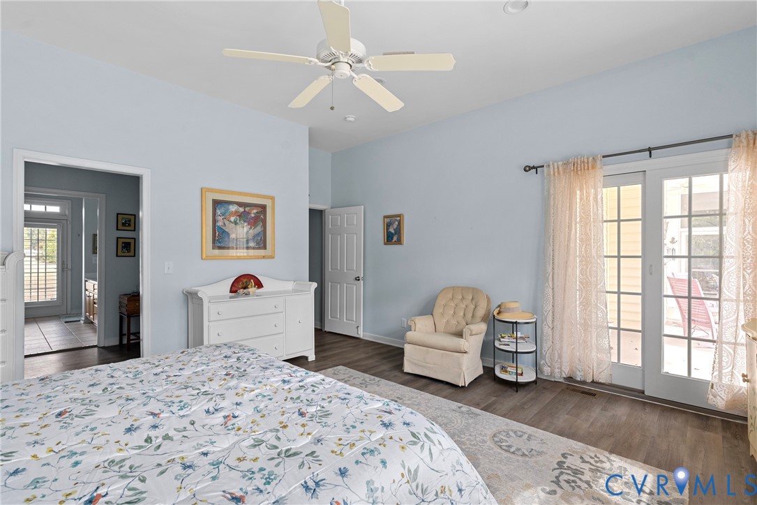 935 Ring Farm Road White Stone, VA 22578 - Photo 27 of 52 Bedroom featuring dark wood-style floors, access t