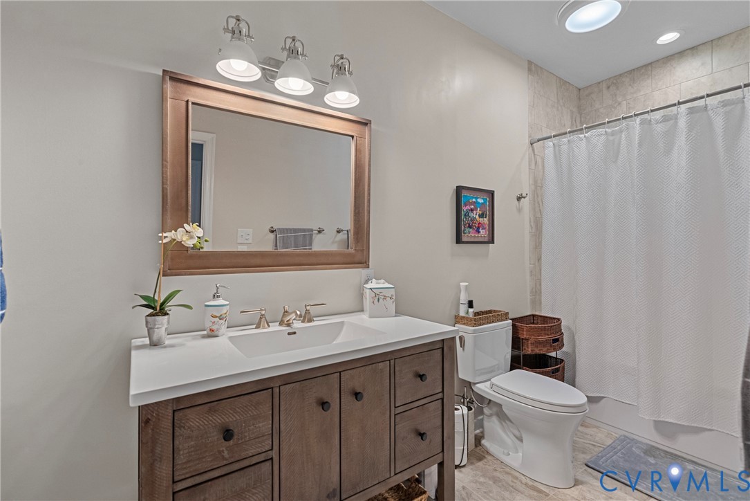 935 Ring Farm Road White Stone, VA 22578 - Photo 36 of 52 Bathroom with vanity and shower / bathtub combinat