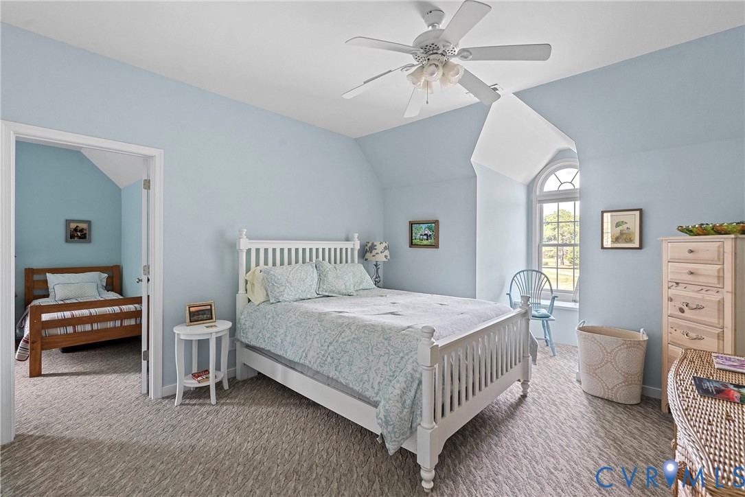 935 Ring Farm Road White Stone, VA 22578 - Photo 40 of 52 Carpeted bedroom featuring lofted ceiling and a ce