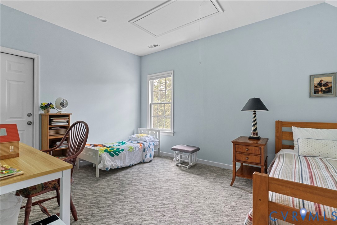 935 Ring Farm Road White Stone, VA 22578 - Photo 41 of 52 Bedroom with carpet flooring and attic access