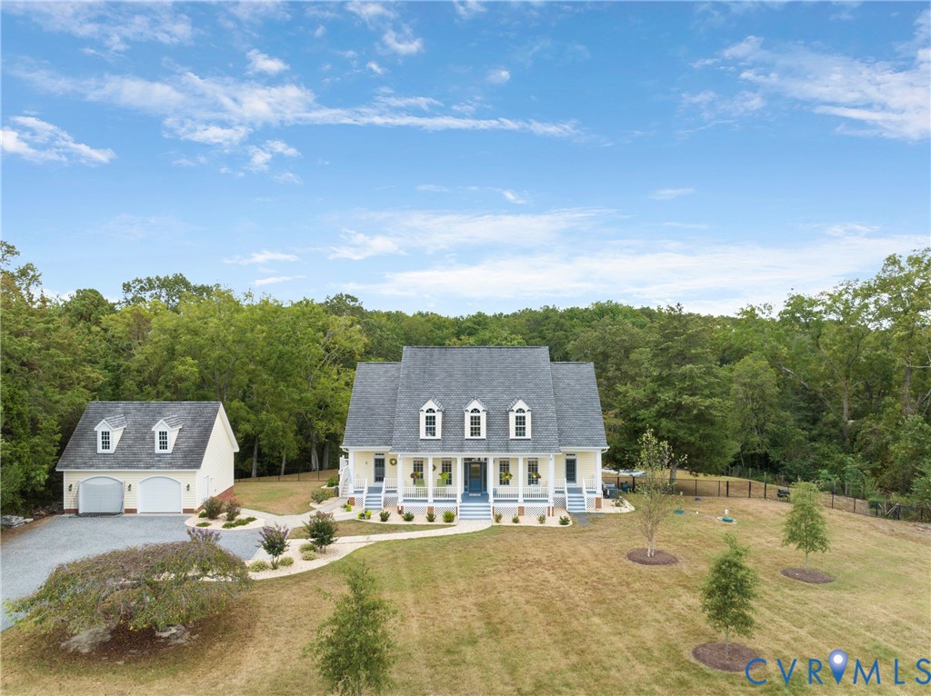935 Ring Farm Road White Stone, VA 22578 - Photo 45 of 52 View of front of house with a porch, a garage, an