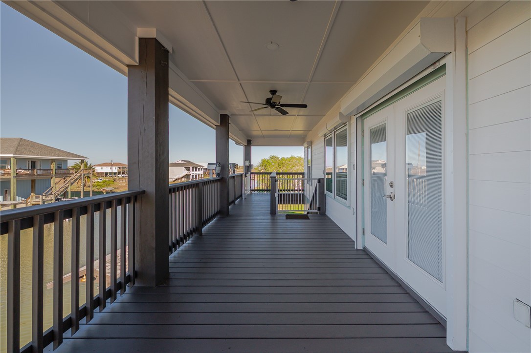 142-143 Channelview Road Rockport, TX 78382 - Photo 28 of 40 a view of a porch with wooden floor