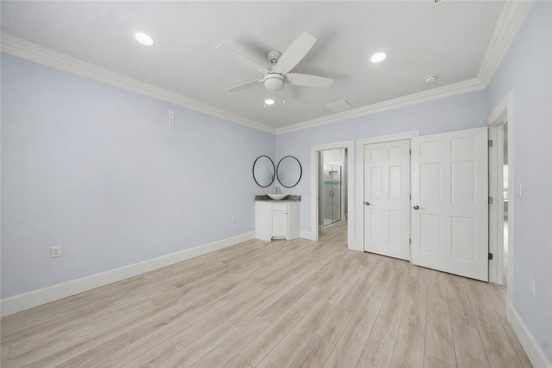 142-143 Channelview Road Rockport, TX 78382 - Photo 30 of 40 a view of an empty room and window and wooden floor