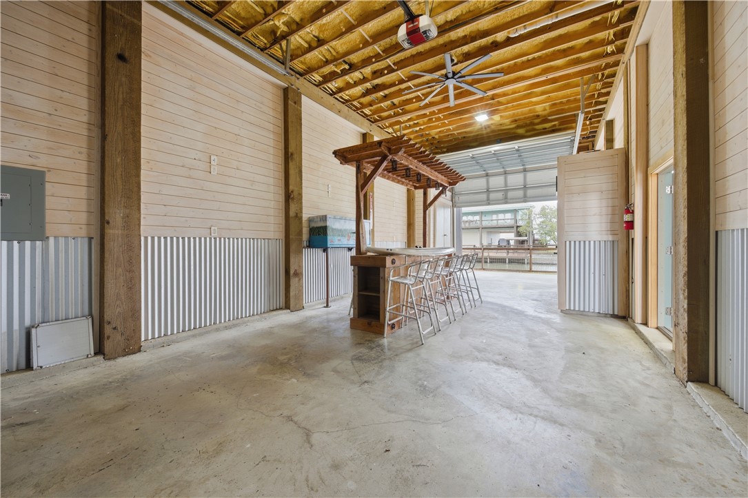 142-143 Channelview Road Rockport, TX 78382 - Photo 34 of 40 a view of a porch with a table and chairs