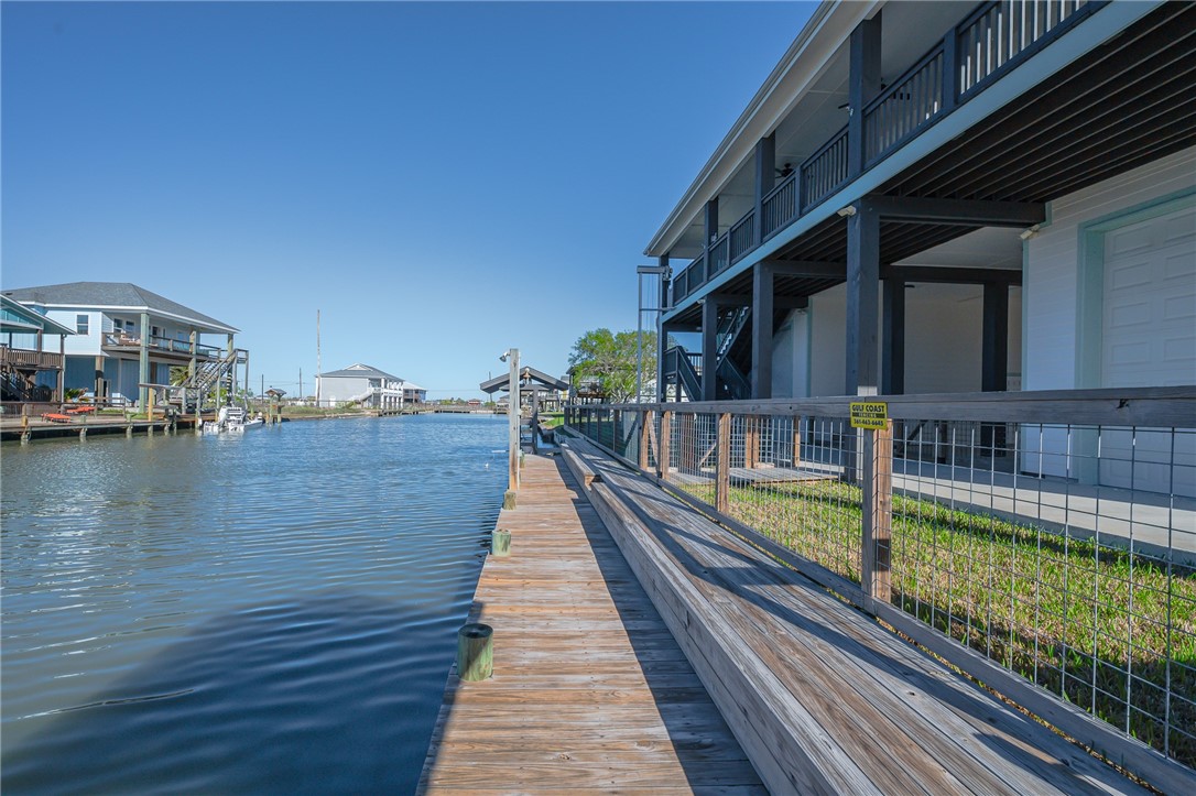 142-143 Channelview Road Rockport, TX 78382 - Photo 4 of 40 a view of swimming pool with outdoor seating and lake view