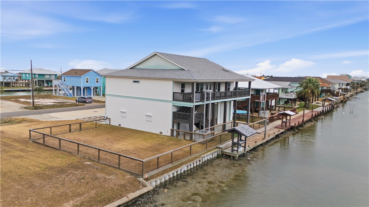 142-143 Channelview Road Rockport, TX 78382 - Photo 5 of 40 a view of a house with pool