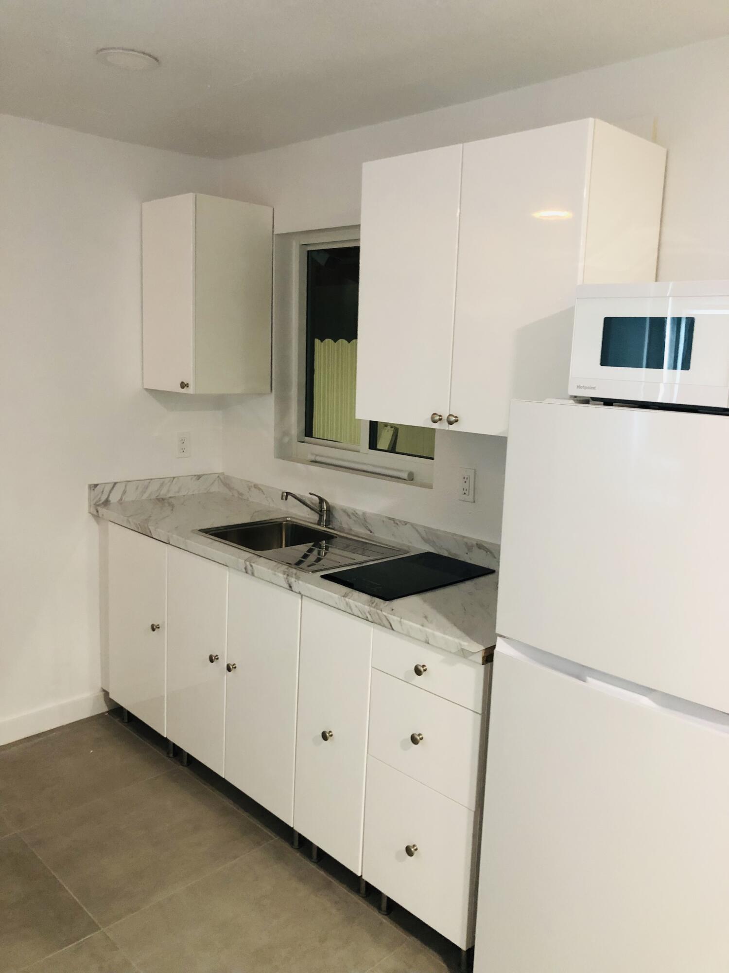 1244 West 27th Street West Palm Beach, FL 33404 - Photo 2 of 8 FullSizeRender