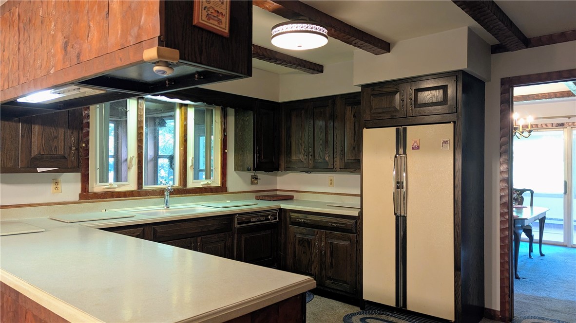 158 Cross Road Otego, NY 13825 - Photo 17 of 50 Beamed ceiling, Corian counters top multiple cabin
