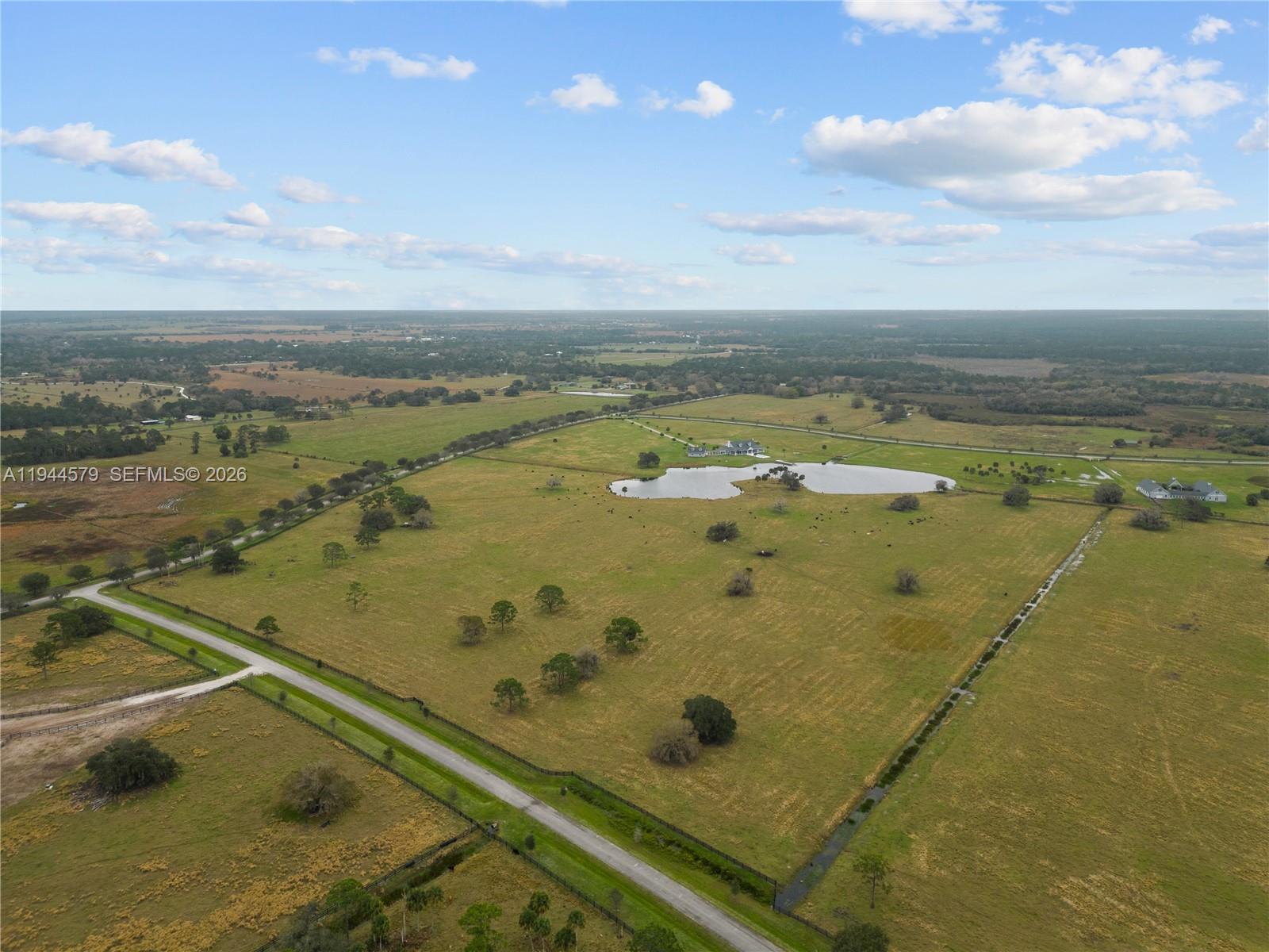 25750 Southwest Jockeys Run Okeechobee, FL 34974 - Photo 13 of 21 a view of a balcony with an ocean