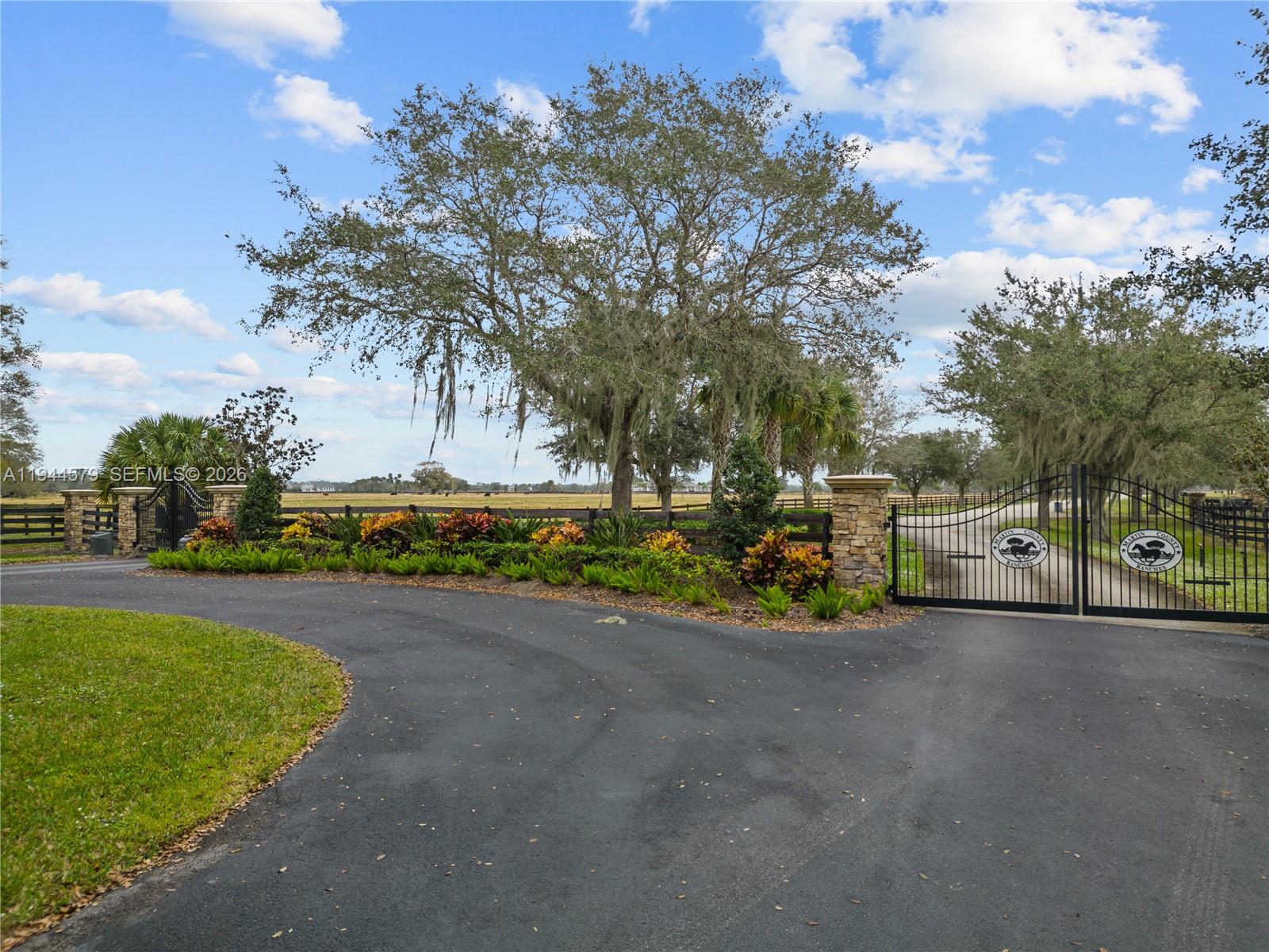 25750 Southwest Jockeys Run Okeechobee, FL 34974 - Photo 20 of 21 a view of a street