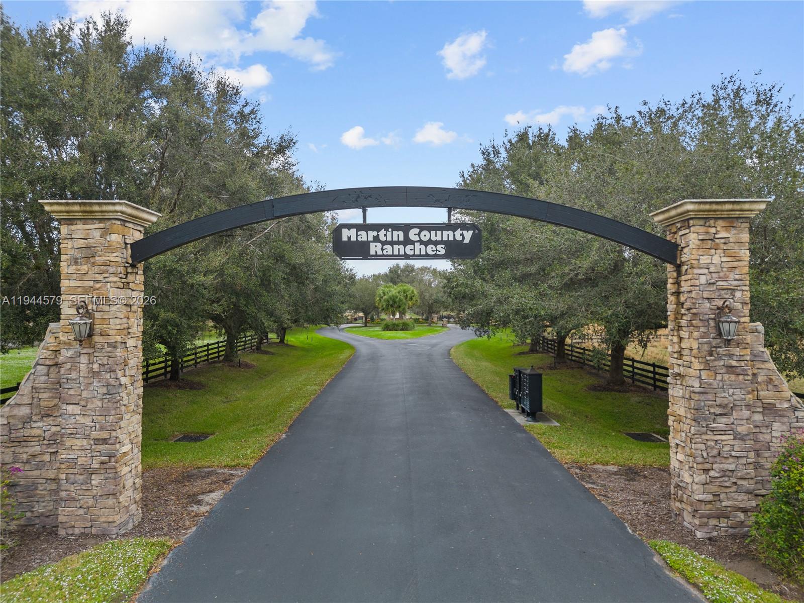 25750 Southwest Jockeys Run Okeechobee, FL 34974 - Photo 2 of 21 a view of a pathway in a garden