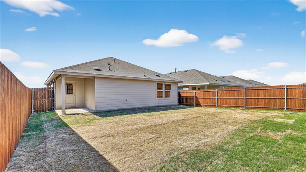 1417 Tin Roof Road Krum, TX 76249 - Photo 15 of 16 Backyard- All Home and community information, including pricing, included features, terms, availability and amenities, are subject to change at any time without notice or obligation. All Drawings, pictures, photographs, video, square footages, floor plans, elevations, features, colors and sizes are approximate for illustration purposes only and will vary from the homes as built.