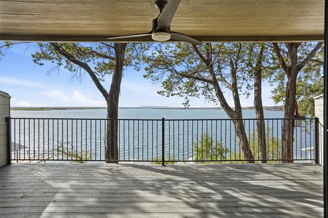 a view of a street with a tree