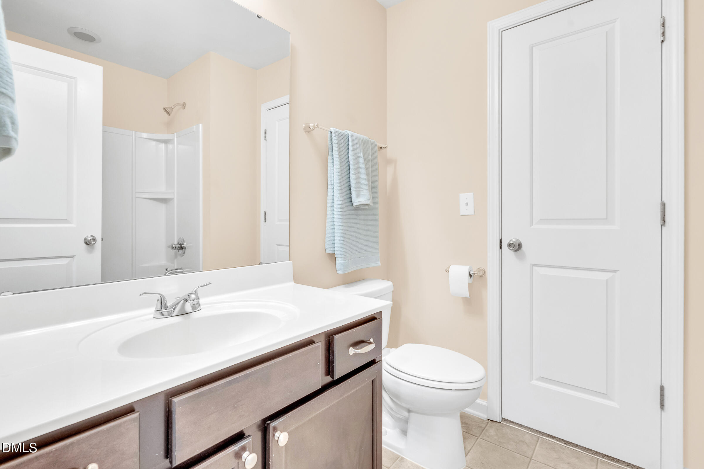 1304 Regulator Street Raleigh, NC 27603 - Photo 23 of 35 a bathroom with a sink a toilet and shower