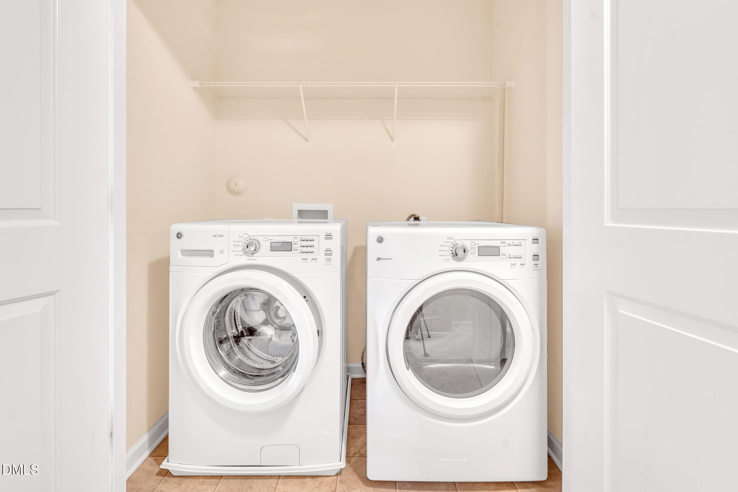 1304 Regulator Street Raleigh, NC 27603 - Photo 26 of 35 a utility room with dryer and washer