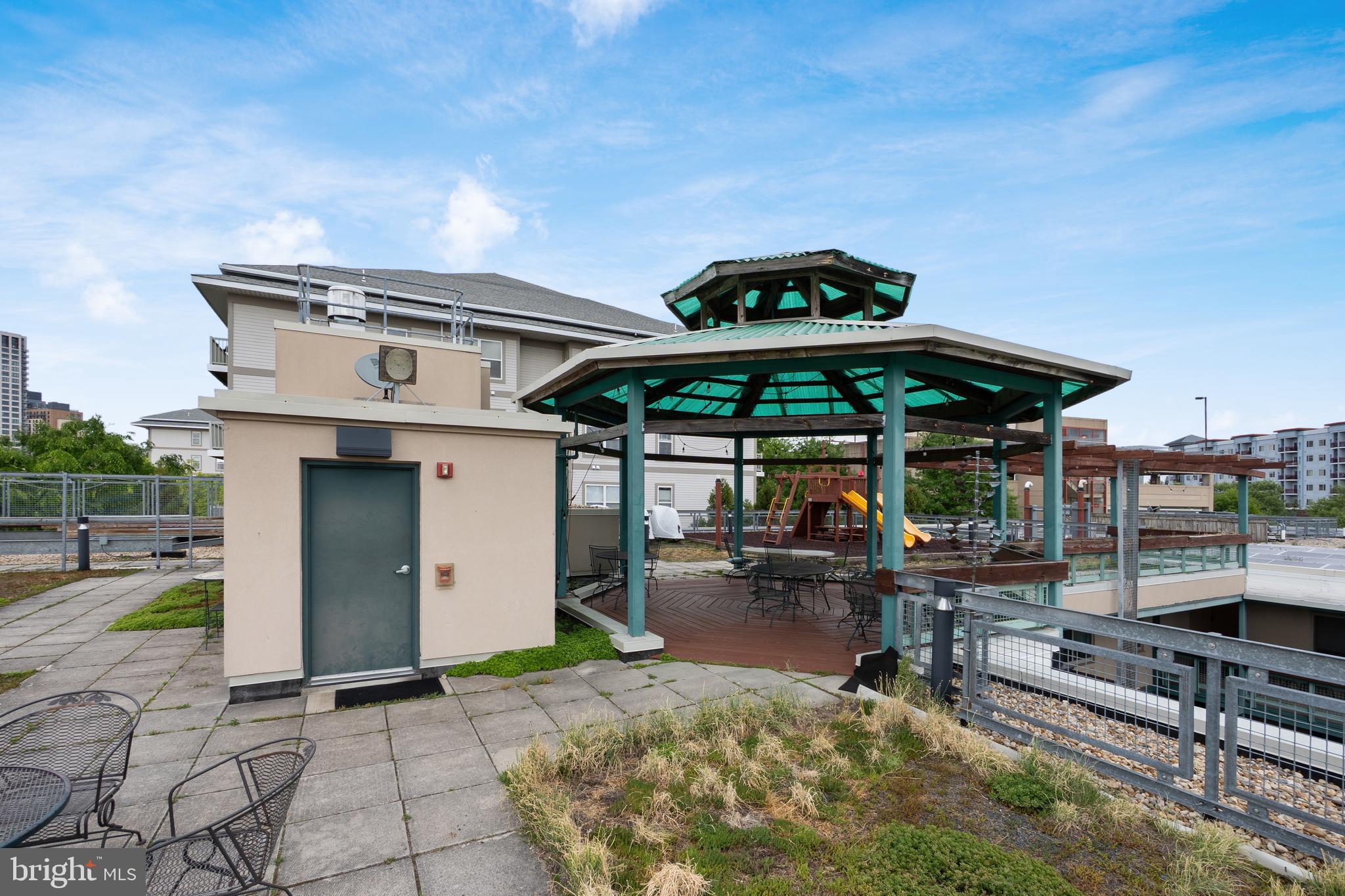 7981 Eastern Avenue Northwest, Unit 219 Silver Spring, MD 20910 - Photo 40 of 45 Common rooftop gazebo for happy hours w/ neighbors