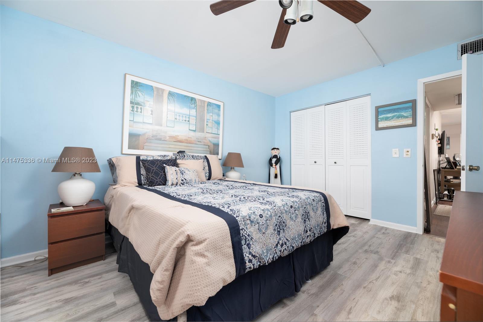 2085 Exeter, Unit 2085 Boca Raton, FL 33434 - Photo 11 of 20 a bedroom with bed and window