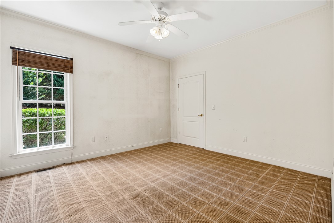 135 Sunset Bay Boulevard Seneca, SC 29672 - Photo 34 of 50 Well-lit room featuring ample natural light, soft carpet, and convenient access.