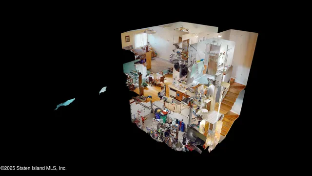 a aerial view of a house with a yard and balcony