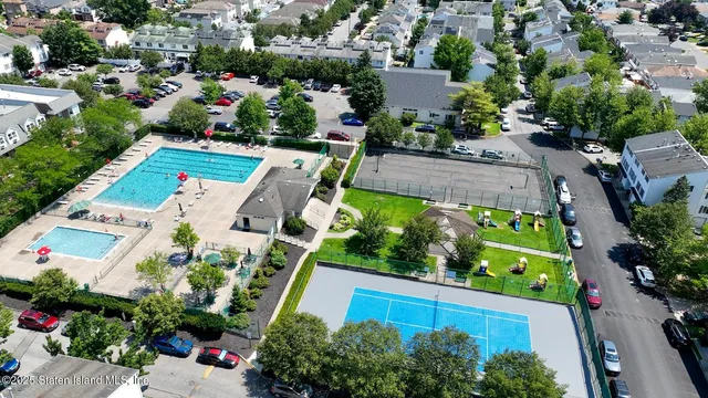 an aerial view of a house with outdoor space