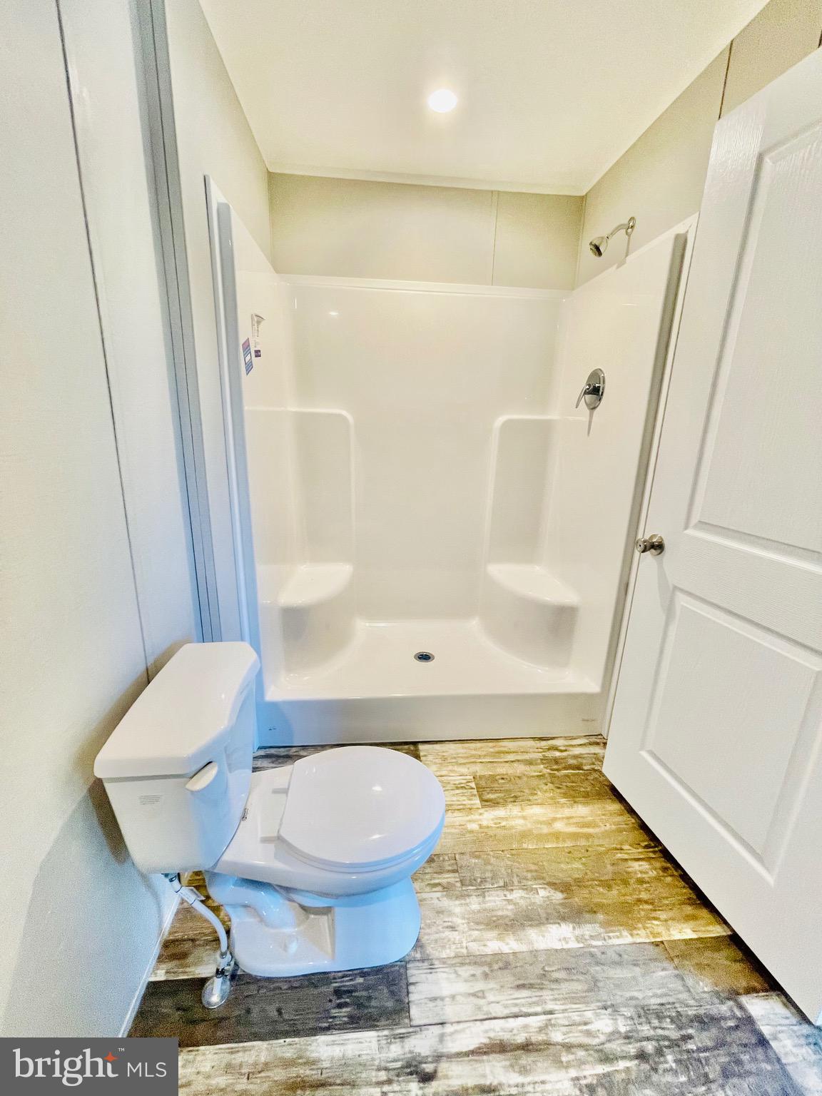 86 Cherokee Avenue Dover, PA 17315 - Photo 24 of 38 a bathroom with a toilet and a shower