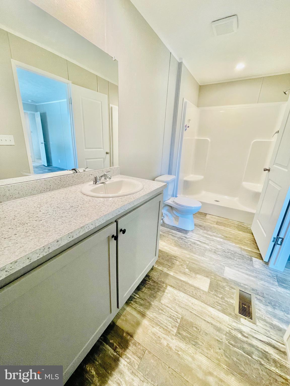 86 Cherokee Avenue Dover, PA 17315 - Photo 26 of 38 a bathroom with a sink and a mirror