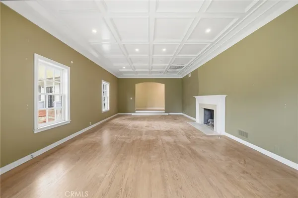 a view of empty room with windows