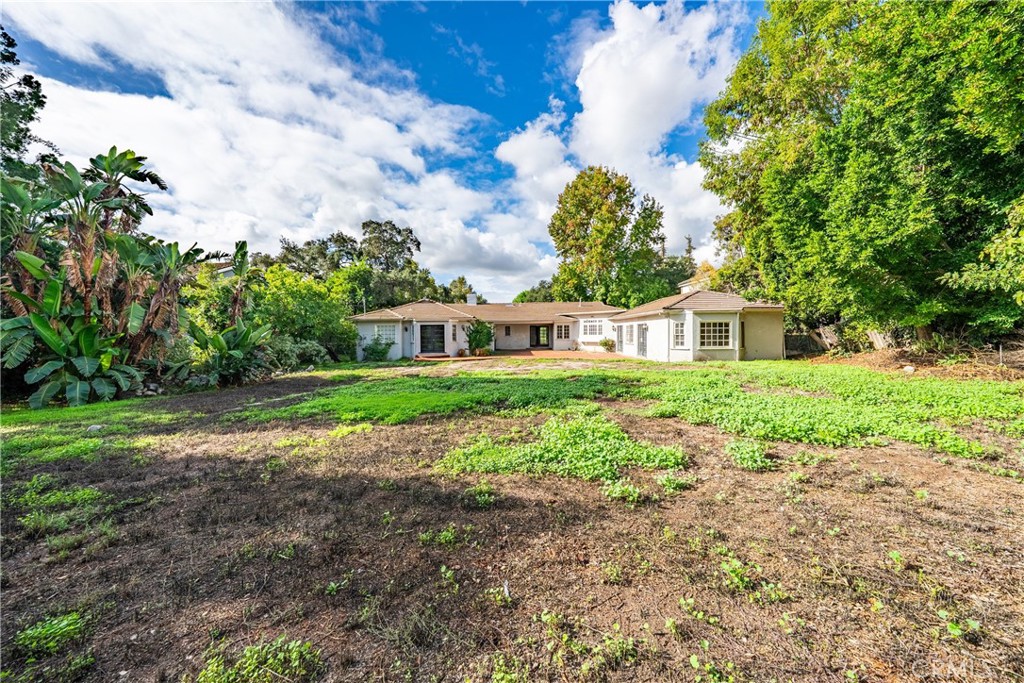 1210 Rodeo Road Arcadia, CA 91006 - Photo 3 of 45 a front view of house with yard and green space