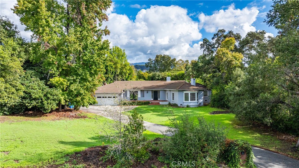 1210 Rodeo Road Arcadia, CA 91006 - Photo 35 of 45 a view of a house with a big yard and large trees