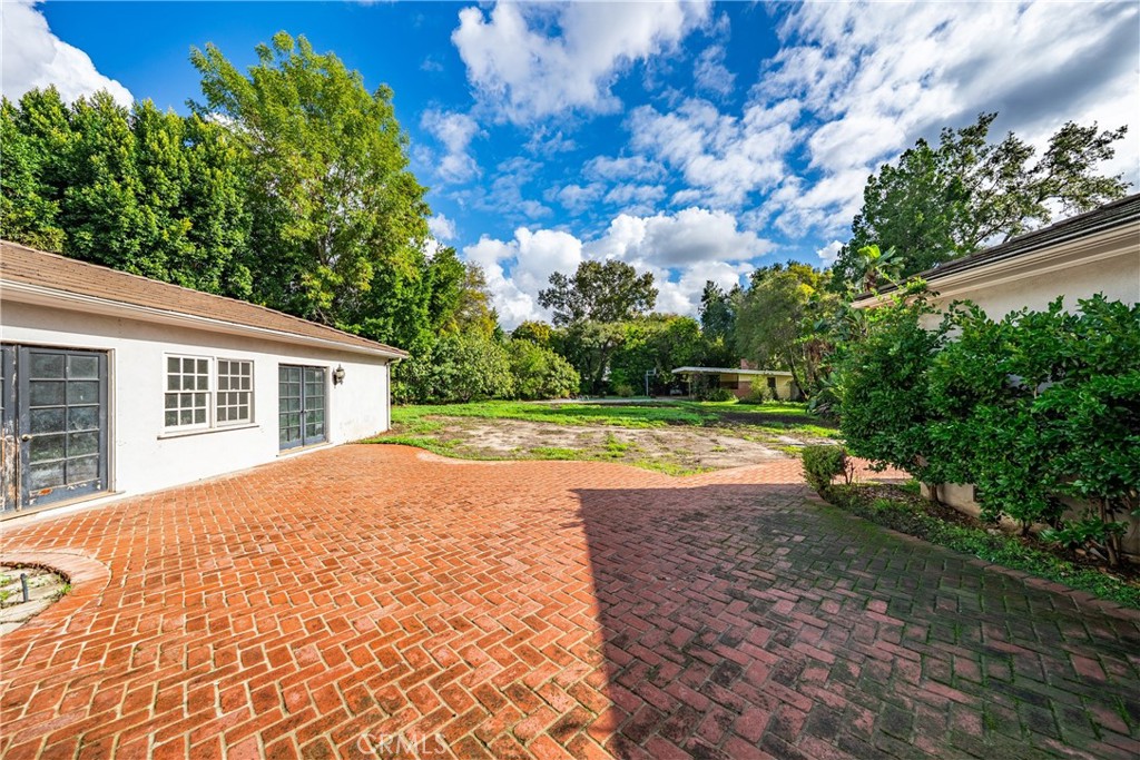 1210 Rodeo Road Arcadia, CA 91006 - Photo 7 of 45 a backyard of a house with lots of green space